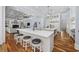 Spacious kitchen with double island, modern pendant lighting, and stainless appliances at 9318 Cove Dr., Myrtle Beach, SC 29572