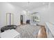 Bright playroom features shiplap walls, a modern chandelier, and a large window at 9318 Cove Dr., Myrtle Beach, SC 29572