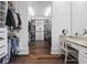 Spacious walk-in closet with custom shelving, drawers, and a dedicated vanity area at 9318 Cove Dr., Myrtle Beach, SC 29572