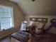 Comfortable attic room with natural light, perfect for relaxation and hobbies at 938 Fox Hollow Rd., Conway, SC 29526