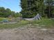View of backyard with construction materials, ideal for custom projects at 938 Fox Hollow Rd., Conway, SC 29526