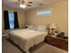 Cozy bedroom with a queen-size bed, neutral decor, and natural light from two windows at 938 Fox Hollow Rd., Conway, SC 29526