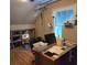 Cozy bedroom features an abundance of natural light and a comfortable workspace at 938 Fox Hollow Rd., Conway, SC 29526
