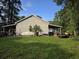 View of garage with carports and boat, with ample space for storage and hobbies at 938 Fox Hollow Rd., Conway, SC 29526