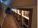 Attic hallway features custom built-in bookcase, offering ample storage and display space at 938 Fox Hollow Rd., Conway, SC 29526