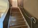 Nautical-themed staircase with unique rope handrail detail leading to the next level of the home at 938 Fox Hollow Rd., Conway, SC 29526