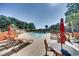 Inviting pool area with lounge chairs and tables, ideal for sunny days and relaxation at 501 Maison Dr. # B10, Myrtle Beach, SC 29572