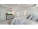 Modern bedroom featuring a dresser, mirror and bright neutral decor at 399 Glacier Way, Conway, SC 29526