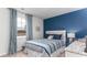 Comfortable bedroom with beautiful curtains, a bright window, and a neutral color palette at 559 Duvall St., Longs, SC 29568