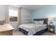 Comfortable bedroom featuring a large window, calm colors, and stylish decor at 559 Duvall St., Longs, SC 29568