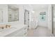 Modern bathroom with white vanity, gold fixtures, and tiled floor at 1035 Milford Way, Myrtle Beach, SC 29588