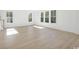Spacious living room with hardwood floors and plenty of natural light at 1035 Milford Way, Myrtle Beach, SC 29588