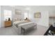 Nicely staged main bedroom with a sitting area, walk-in closet, and carpeted floors at 1035 Milford Way, Myrtle Beach, SC 29588
