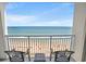 Ocean view from balcony with chairs overlooking the beach, perfect for relaxing and enjoying the scenery at 2000 N Ocean Blvd. # 1612, Myrtle Beach, SC 29577