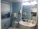 Bright bathroom featuring an elegant vanity, toilet, and a large mirror, with an ocean view at 2000 N Ocean Blvd. # 1612, Myrtle Beach, SC 29577