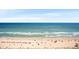 Expansive ocean view with beach access and colorful umbrellas dotting the sandy shore at 2000 N Ocean Blvd. # 1612, Myrtle Beach, SC 29577