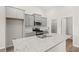 Modern kitchen with granite countertops, stainless steel appliances, and ample cabinet space at 371 Lifestyle Court, Surfside Beach, SC 29575