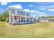 Charming two-story home featuring a cozy front porch and large front yard at 3747 Bakers Chapel Rd., Aynor, SC 29511