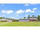 Inviting two-story home with a manicured lawn and plenty of parking space on a sunny day at 3747 Bakers Chapel Rd., Aynor, SC 29511
