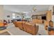 Comfortable living room with plush sofas, a large window, and an entertainment center at 3747 Bakers Chapel Rd., Aynor, SC 29511