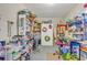 Functional room with shelving and many surfaces covered with craft supplies at 3747 Bakers Chapel Rd., Aynor, SC 29511