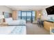 Inviting bedroom featuring ocean views and comfortable furnishings at 6900 N Ocean Blvd. # 812, Myrtle Beach, SC 29572