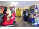 Game room offering a variety of arcade games and entertainment, including driving simulators and claw games at 6900 N Ocean Blvd. # 812, Myrtle Beach, SC 29572