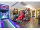 Fun game room featuring interactive games and arcade entertainment with machines like ICE BALL and RAW THRILLS at 6900 N Ocean Blvd. # 812, Myrtle Beach, SC 29572