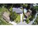 Aerial view showing the property, pool, fenced yard, and the surrounding neighborhood at 104 Sprucewood Ct., Myrtle Beach, SC 29588