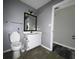Bright bathroom featuring a white vanity and a decorative light fixture at 104 Sprucewood Ct., Myrtle Beach, SC 29588