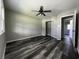 Bedroom featuring a ceiling fan, closet, and new flooring at 104 Sprucewood Ct., Myrtle Beach, SC 29588