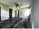 Spacious bedroom featuring modern ceiling fan and new flooring at 104 Sprucewood Ct., Myrtle Beach, SC 29588
