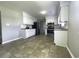 Bright eat-in kitchen featuring stainless steel appliances, granite counters and tile floor at 104 Sprucewood Ct., Myrtle Beach, SC 29588