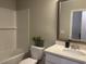 A clean, bright bathroom with a tub and shower combination and a modern vanity at 3131 Tiger Tail Rd., Conway, SC 29526