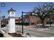 Historic clock tower in downtown streetscape with well-maintained architecture and a vibrant community atmosphere at 3131 Tiger Tail Rd., Conway, SC 29526