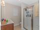 Bathroom boasting a glass-enclosed shower, vanity with counter space, and modern fixtures at 3412 Holly Loop, Conway, SC 29527