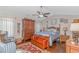 Comfortable bedroom with hardwood floors, ceiling fan, and traditional decor at 3412 Holly Loop, Conway, SC 29527