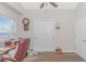 Office featuring a ceiling fan, desk with workspace, view of a wall clock, and a closet at 3412 Holly Loop, Conway, SC 29527