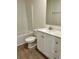 Well-lit bathroom with white vanity, drawers, and shower/tub combination at 74 Greentown Rd., Georgetown, SC 29440