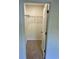 Walk-in closet offers ample storage space with carpet flooring and wire shelving at 74 Greentown Rd., Georgetown, SC 29440