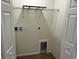 Interior laundry area with flooring, wire shelving and utility hookups at 74 Greentown Rd., Georgetown, SC 29440