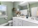 Charming bathroom with a single vanity, neutral decor, and a shower with a decorative curtain at 100 Lure Ct., Conway, SC 29526