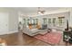 Open-concept living room with a large sectional sofa, open to the modern kitchen and dining area at 100 Lure Ct., Conway, SC 29526