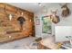 This office features wood paneled wall with trophy mounts, a large desk and neutral carpet at 100 Lure Ct., Conway, SC 29526