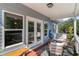 Cozy porch seating with stylish decor, perfect for enjoying outdoor relaxation and views at 100 Lure Ct., Conway, SC 29526