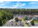 Aerial view featuring community amenities, waterfront access, and lush greenery, offering a picturesque setting at 202 Ave. Of The Palms, Myrtle Beach, SC 29579
