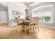 The dining room has a table with seating for six and natural light at 202 Ave. Of The Palms, Myrtle Beach, SC 29579