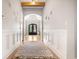 Charming foyer with hardwood floors, decorative rug, and stylish decor creating a welcoming entrance at 202 Ave. Of The Palms, Myrtle Beach, SC 29579