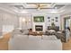 Spacious living room featuring a fireplace, ceiling fan, and comfortable couches at 202 Ave. Of The Palms, Myrtle Beach, SC 29579