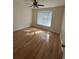 Bedroom with hardwood floors and a bay window at 902 N 11Th Ave. N, North Myrtle Beach, SC 29582